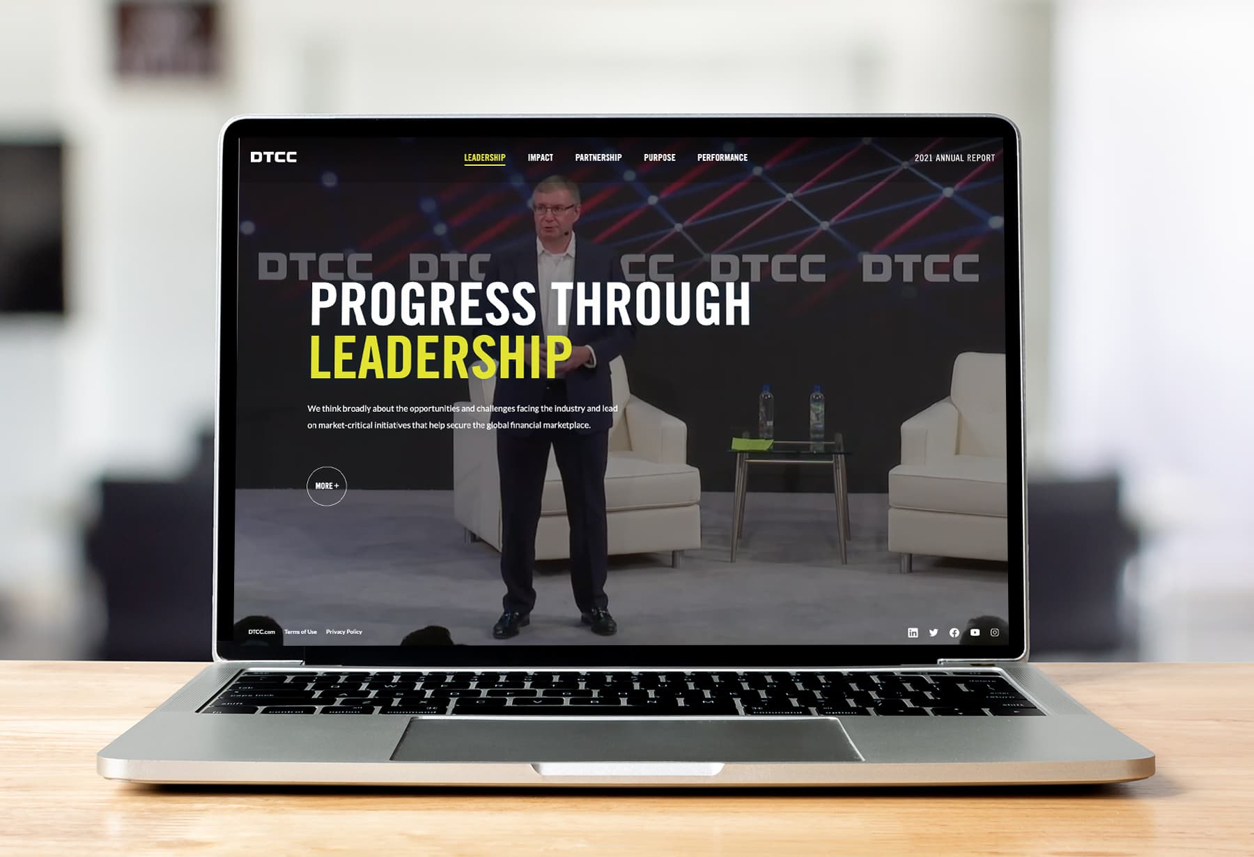 Home page of the DTCC Annual Report displayed on a laptop screen